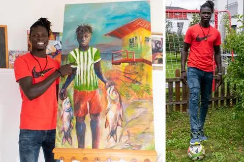Stolz zeigt Lucien Diassy seine Herkunft als Sohn einer Fischerfamilie im Senegal. Das Bild hat seine deutsche Ehefrau Kathrin Funk gemalt. Und Fußball ist sein Lieblingssport. Patricia Bastian-Geib