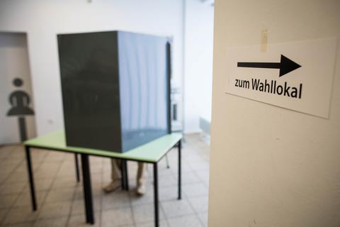 Eine Wahlkabine. Foto: dpa/Maja Hitij
