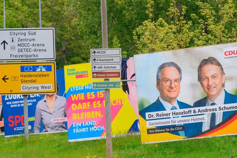 Wahlplakate in Magdeburg, vorneweg der amtierende Ministerpräsident und CDU-Spitzenkandidat Reiner Haseloff.  Foto: dpa 